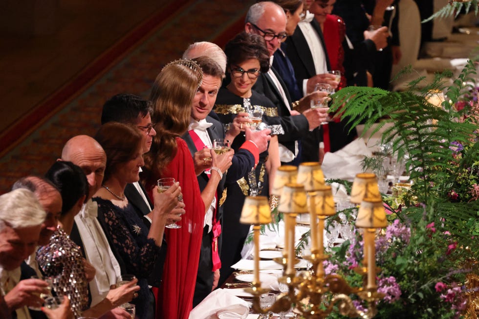 frances president emmanuel macron (c) makes a toast with britains catherine, princess of wales (c l) during a state banquet at windsor castle, west of london, on july 8, 2025, on the first day of a three day state visit of french president to britain. french president emmanuel macron began a three day state visit to britain on tuesday, which saw him address parliament and try to rekindle a purportedly warm relationship with king charles iii. (photo by ludovic marin / pool / afp) (photo by ludovic marin/pool/afp via getty images) 