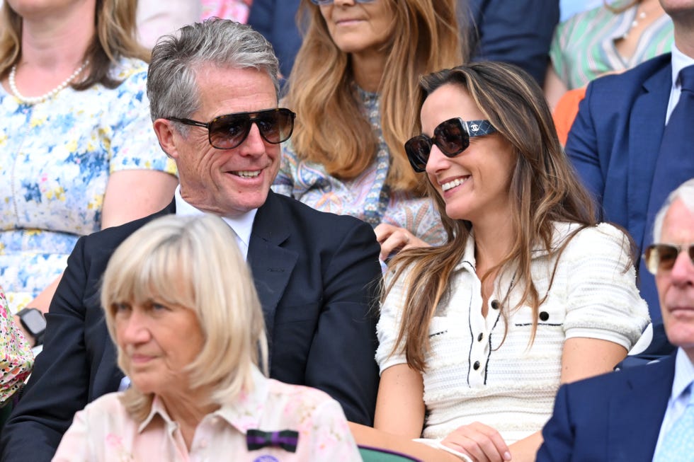 london, england july 09: hugh grant and anna elisabet eberstein attend day ten of the wimbledon tennis championships at the all england lawn tennis and croquet club on july 09, 2025 in london, england. (photo by karwai tang/wireimage)