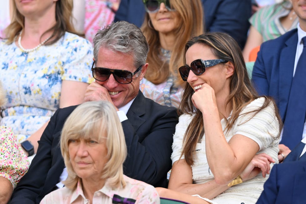 london, england july 09: hugh grant and anna elisabet eberstein attend day ten of the wimbledon tennis championships at the all england lawn tennis and croquet club on july 09, 2025 in london, england. (photo by karwai tang/wireimage)