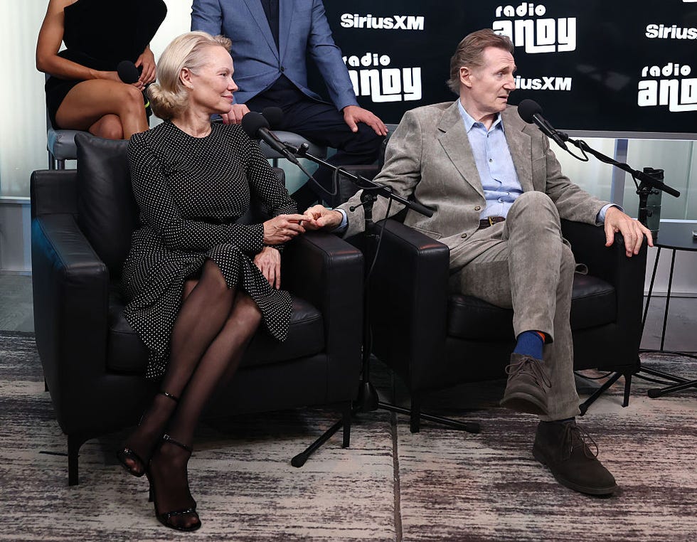 new york, new york july 30: pamela anderson and liam neeson speak during siriusxms town hall with the cast of the naked gun hosted by andy cohen at siriusxm studios on july 30, 2025 in new york city. (photo by cindy ord/getty images for siriusxm)