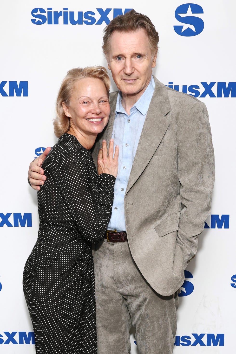 new york, new york july 30: pamela anderson and liam neeson attend siriusxms town hall with the cast of the naked gun hosted by andy cohen at siriusxm studios on july 30, 2025 in new york city. (photo by cindy ord/getty images for siriusxm)