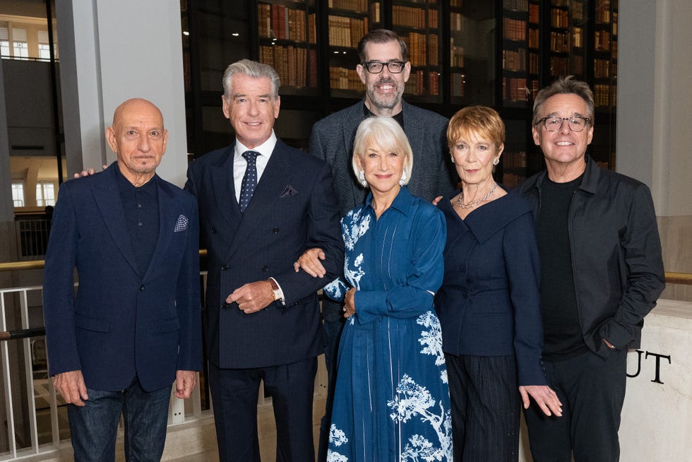 london, england august 19: (l r) sir ben kingsley, pierce brosnan, dame helen mirren, richard osman, celia imrie and chris columbus attend "the thursday murder club" photocall at the british library on august 19, 2025 in london, england. (photo by eamonn m. mccormack/getty images)