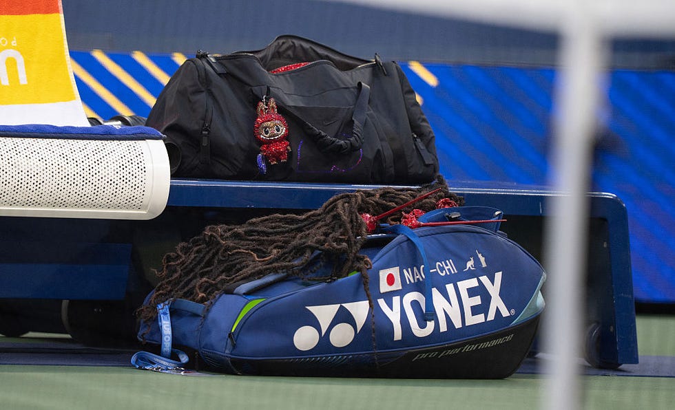 new york, new york august 25: detailed view of the bag of naomi osaka of japan with a bedazzled labubu and her headdress during her womens singles first round match on day three against greet minnen of belgium at the 2025 us open at usta billie jean king national tennis center on august 24, 2025 in new york city. (photo by susan mullane/isi photos/isi photos via getty images)
