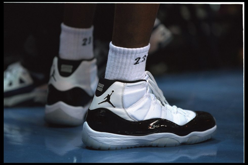 14 nov 1995 the shoes of guard michael jordan 23 of the chicago bulls grace the sideline at the orlando arena in orlando, florida, during the game against the orlando magic  the magic defeated the bulls 94 88  mandatory credit  allsport usaallsport