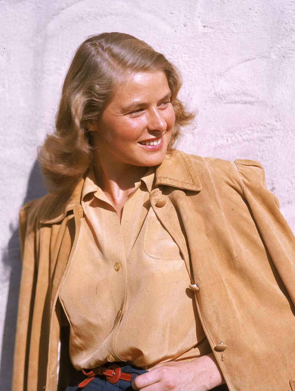 swedish born actor ingrid bergman 1915   1982 smiles as she poses outdoors, wearing a tan leather jacket, circa 1945 photo by hulton archivegetty images