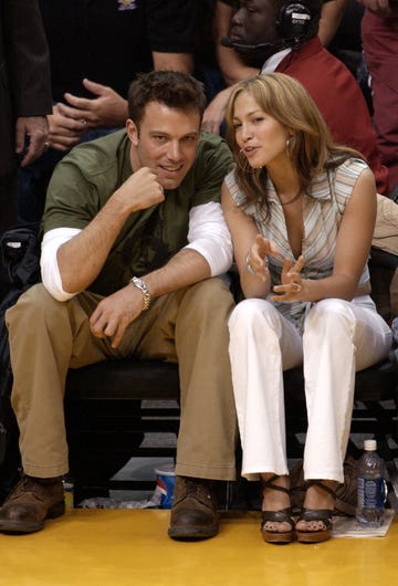 los angeles, ca   may 11  file photo actor ben affleck l and his fiance actresssinger jennifer lopez attend the los angeles lakers v san antonio spurs playoff game at the staples center may 11, 2003 in los angeles, california  lopez and affleck postponed their wedding, which was scheduled for this weekend, and has now reportedly spit up, possibly temporarily   photo by vince buccigetty images