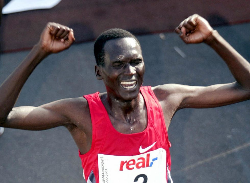 paul tergat from kenia jubilates after breaking a new world record 2hrs 55secs in the berlin marathon 28 september 2003 about 44000 runners took part in the 30th berlin marathon tergat beats the previous world best time of 20538 set by moroccan born american khalid khannouchi afp photoddp michael kappeler photo credit should read michael kappelerddpafp via getty images