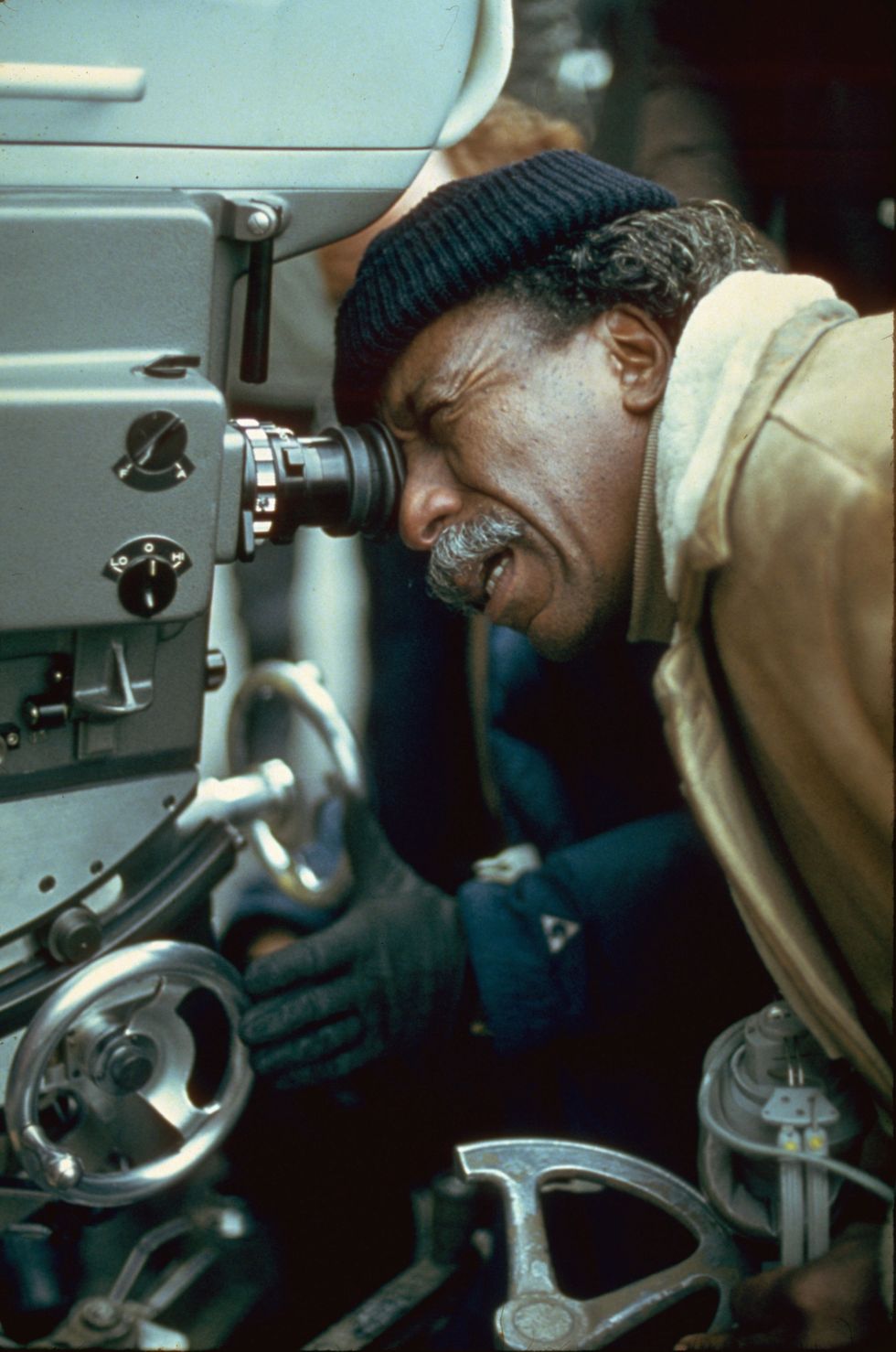 american film director and photographer gordon parks looks through the viewfinder of a camera on the set of a film, circa 1971 photo by hulton archivegetty images
