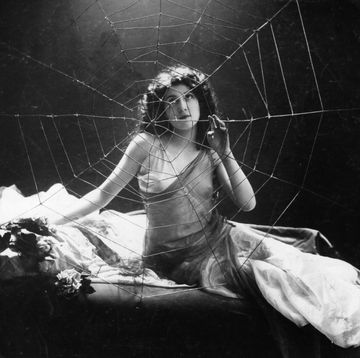 french actress and singer jeanne dirys aka jane dirys, aka jeanne iribe, 1886 1922 posing behind a large artificial spiders web, circa 1910 photo by léopold Émile reutlingerhulton archivegetty images