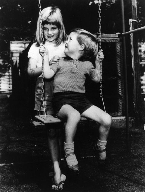 Lady Diana Frances Spencer (1961 - 1997), playing with her brother Charles Edward Maurice, the Viscount Althorp, in the grounds of Park House, Sandringham when she was six years old.