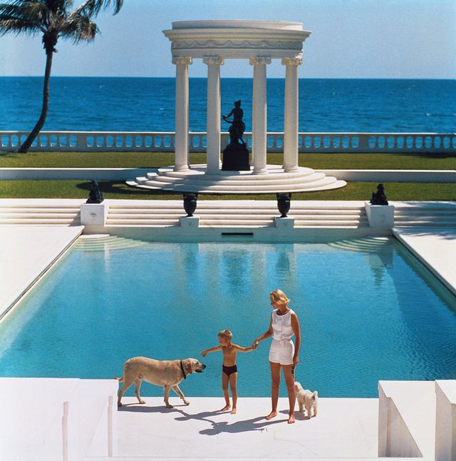 american writer cz guest mrs fc winston guest, 1920   2003 and her son alexander michael douglas dudley guest in front of their grecian temple pool on the ocean front estate, villa artemis, palm beach original publication a wonderful time   slim aarons  photo by slim aaronsgetty images