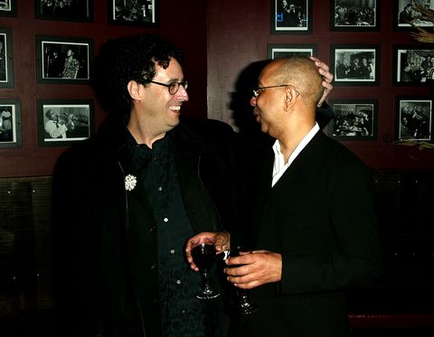 new york   november 23  tabloids and hollywood reporter out  writer tony kushner and director george c wolfe at the after party for the play opening of caroline, or change november 23, 2003 in new york city  photo by peter kramergetty images