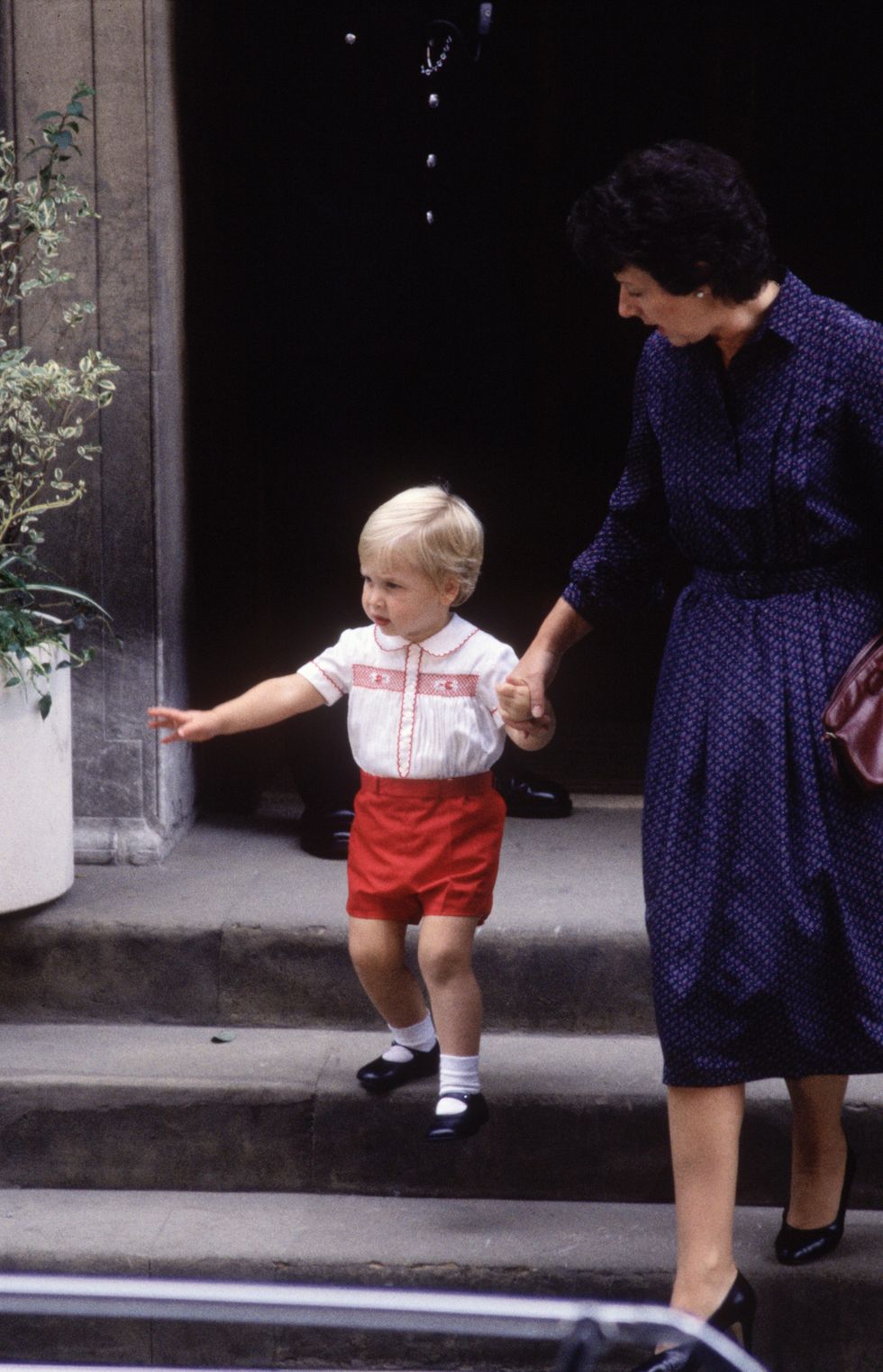 london   september 16 prince william with his nanny barbara barnes leave st mary's hospital on september 15, 1984 paddington, london, england, having visited his newborn brother prince harry, in the lindo wing with his mother diana princess of wales photo by david levensongetty images