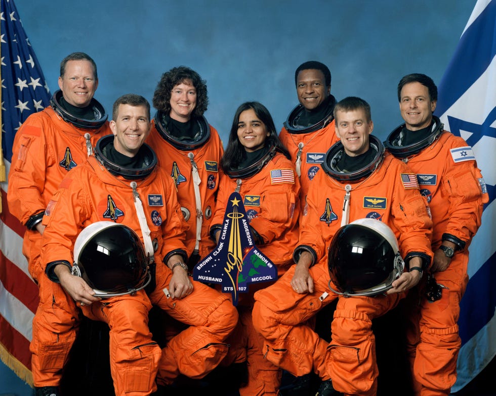 undated file photo the crew of space shuttle columbias mission sts 107 take a break from their training regime to pose for the traditional crew portrait seated in front are astronauts rick d husband l, mission commander kalpana chawla, mission specialist and william c mccool, pilot standing are l to r astronauts david m brown, laurel b clark, and michael p anderson, all mission specialists and ilan ramon, payload specialist representing the israeli space agency the space shuttle columbia broke up over texas during re entry on february 1, 2003 photo by nasagetty images