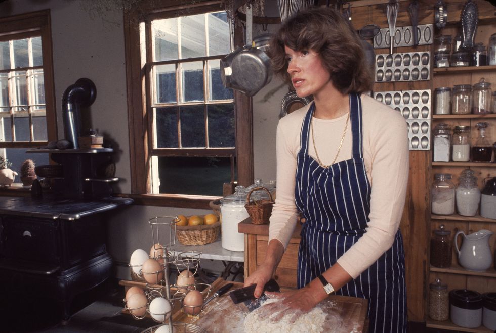 american media mogul and businesswoman martha stewart kneads flour in a fully stocked kitchen, august 1976 photo by susan woodgetty images