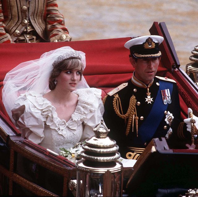 prince charles, prince of wales and diana, princess of wales, wearing a wedding dress designed by david and elizabeth emanuel and the spencer family tiara, ride in an open carriage, from st pauls cathedral to buckingham palace, following their wedding on july 29, 1981 in london, england photo by anwar husseingetty images