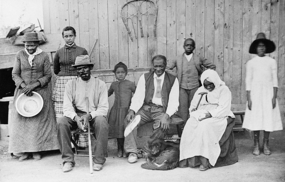 Harriet Tubman (far left), circa 1900
