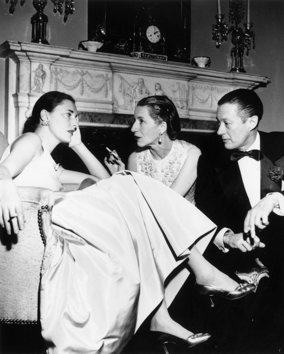 31st december 1952 from left to right, slim hawks nee nancy gross, former wife of director howard hawks chatting with vogue editor diana vreeland 1903 1989 and her husband reed at kitty millers new years eve party in park avenue, new york photo by slim aaronsgetty images