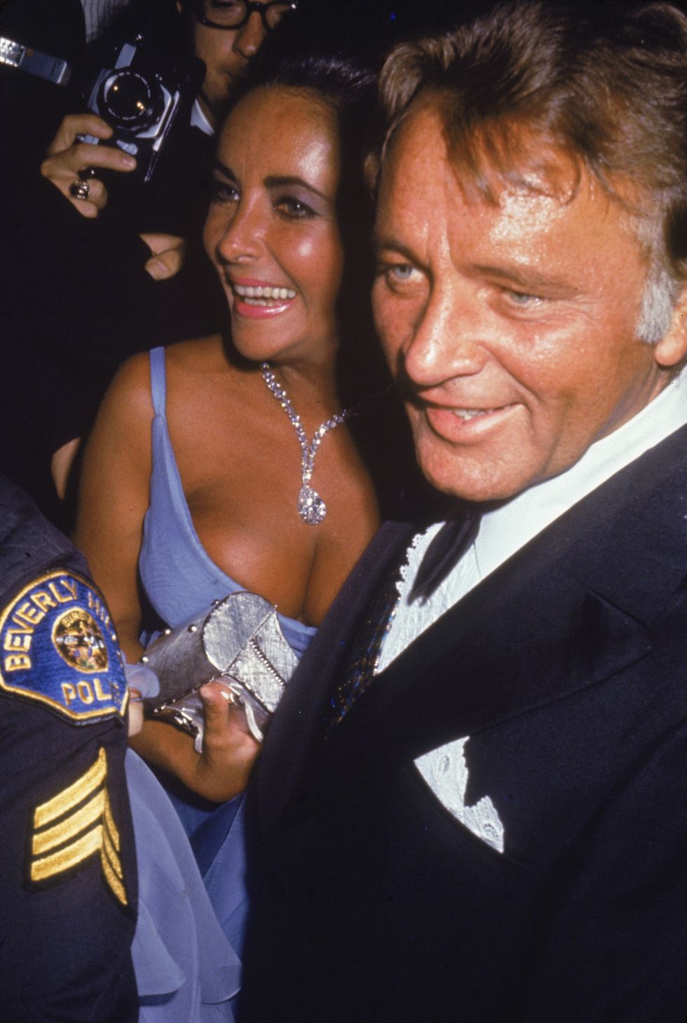 married actors elizabeth taylor and richard burton 1925   1984 smile as they attend the academy awards ceremonies, los angeles, california, april 7, 1970 photo by fotos internationalgetty images