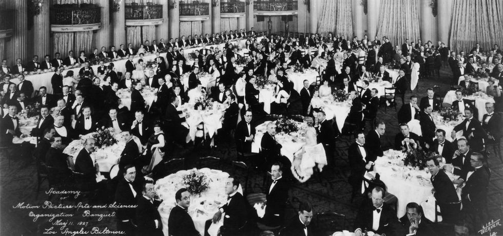 11th may 1927  interior view of formally dressed men and women seated at tables during the first organizational meeting of the academy of motion picture arts and sciences in the crystal ballroom of the los angeles biltmore hotel mary pickford, douglas fairbanks, louis b mayer, jack l warner and darryl f zanuck attended the banquet  photo by hulton archivegetty images