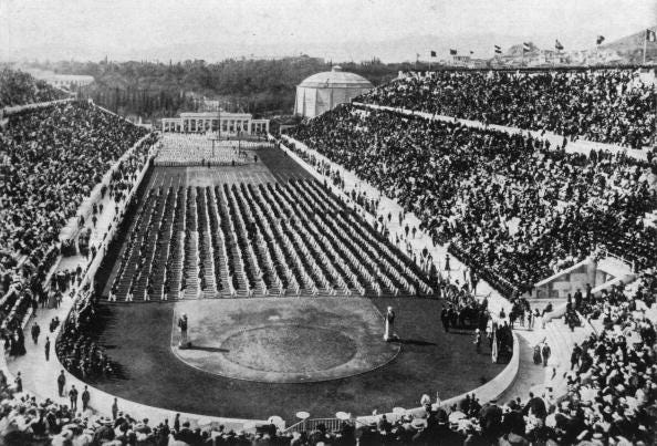1896  view of athletes, standing in rows, and crowds filling the stadium at the 1896 olympic games in athens, greece  photo by hulton archivegetty images