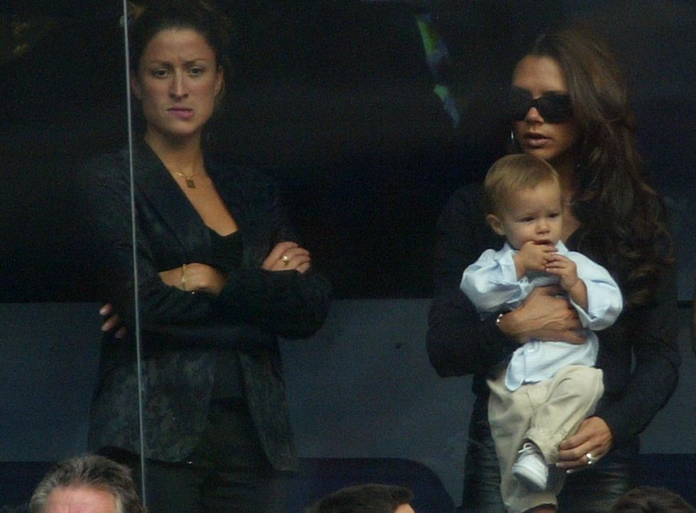 madrid, spain september 13 file photo victoria beckham holds son romeo beside david beckhams pa rebecca loos during the spanish primera liga match between real madrid and valladolid at the santiago bernabeu stadium on september 13, 2003 in madrid, spain david beckham and former pa rebecca loos are under scrutiny for an alleged affair, reported by the news of the world this weekend photo by shaun botterillgetty images