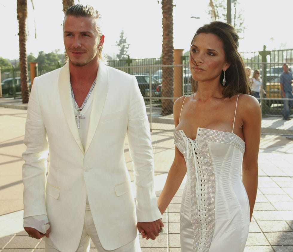los angeles may 31: (file photo) david and victoria beckham attend the 2003 mtv movie awards held at the shrine auditorium on may 31, 2003 in los angeles, california. david beckham and former pa rebecca loos are under scrutiny for an alleged affair, reported by the news of the world this weekend. (photo by kevin winter/getty images)