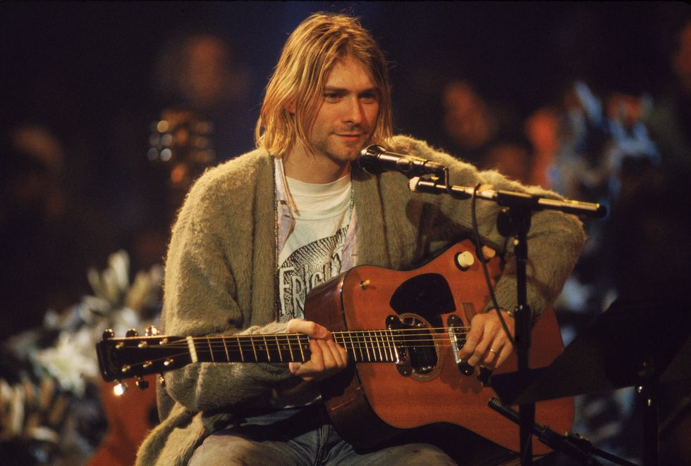 american singer and guitarist kurt cobain 1967   1994, performs with his group nirvana at a taping of the television program mtv unplugged, new york, new york, novemeber 18, 1993 photo by frank micelottagetty images