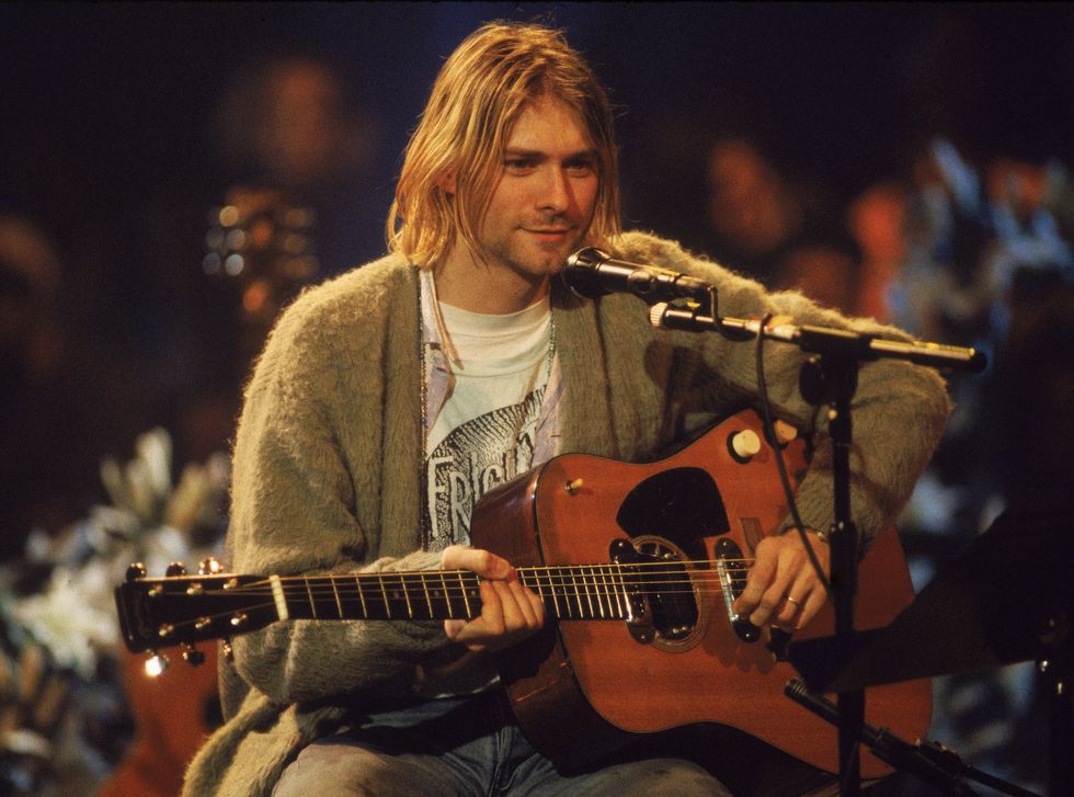 american singer and guitarist kurt cobain 1967   1994, performs with his group nirvana at a taping of the television program mtv unplugged, new york, new york, novemeber 18, 1993 photo by frank micelottagetty images