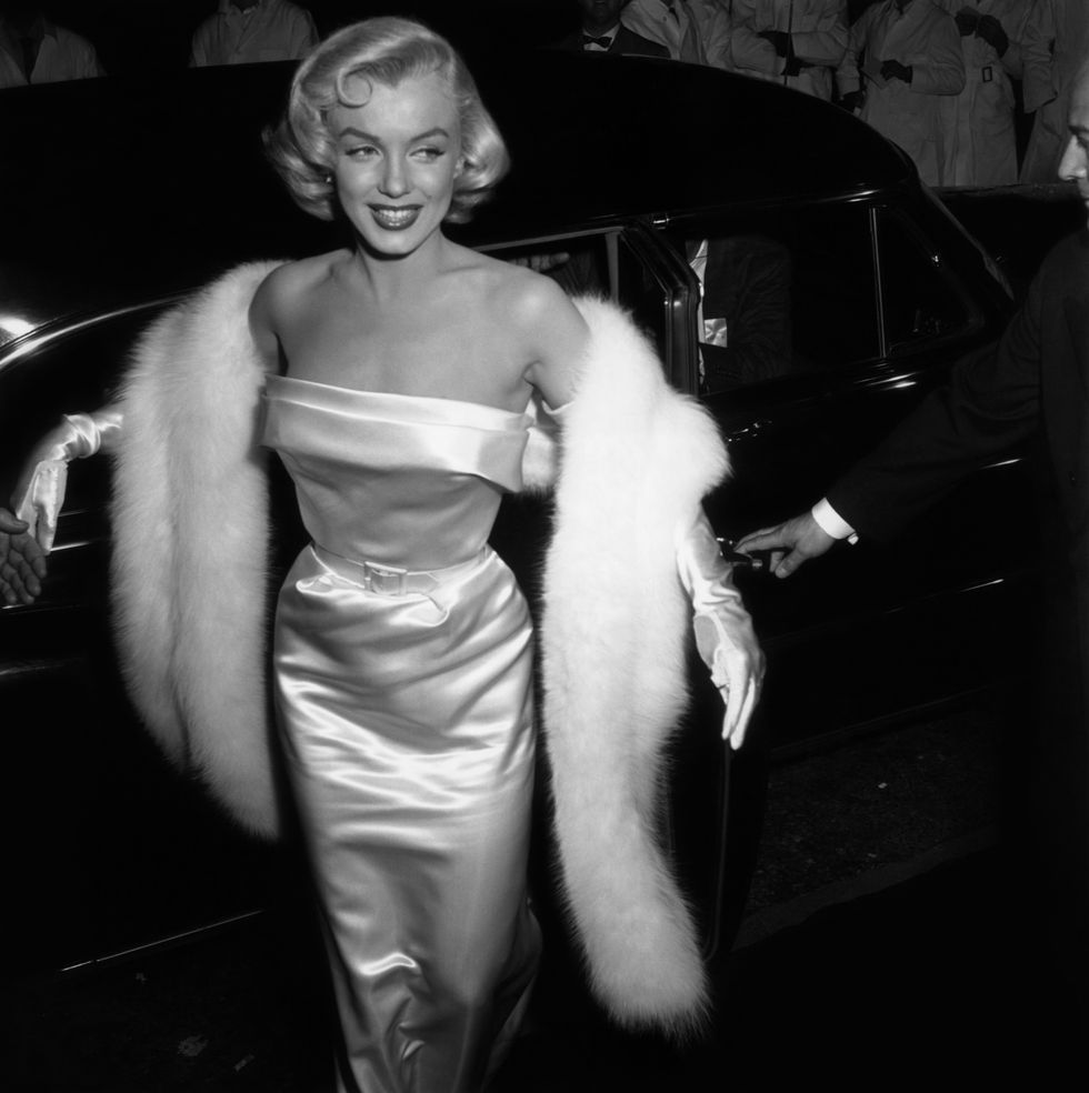 1954  exclusive marilyn monroe 1926    1962 arriving at the premiere of  the film theres no business like show business  photo by m garrettmurray garrettgetty images