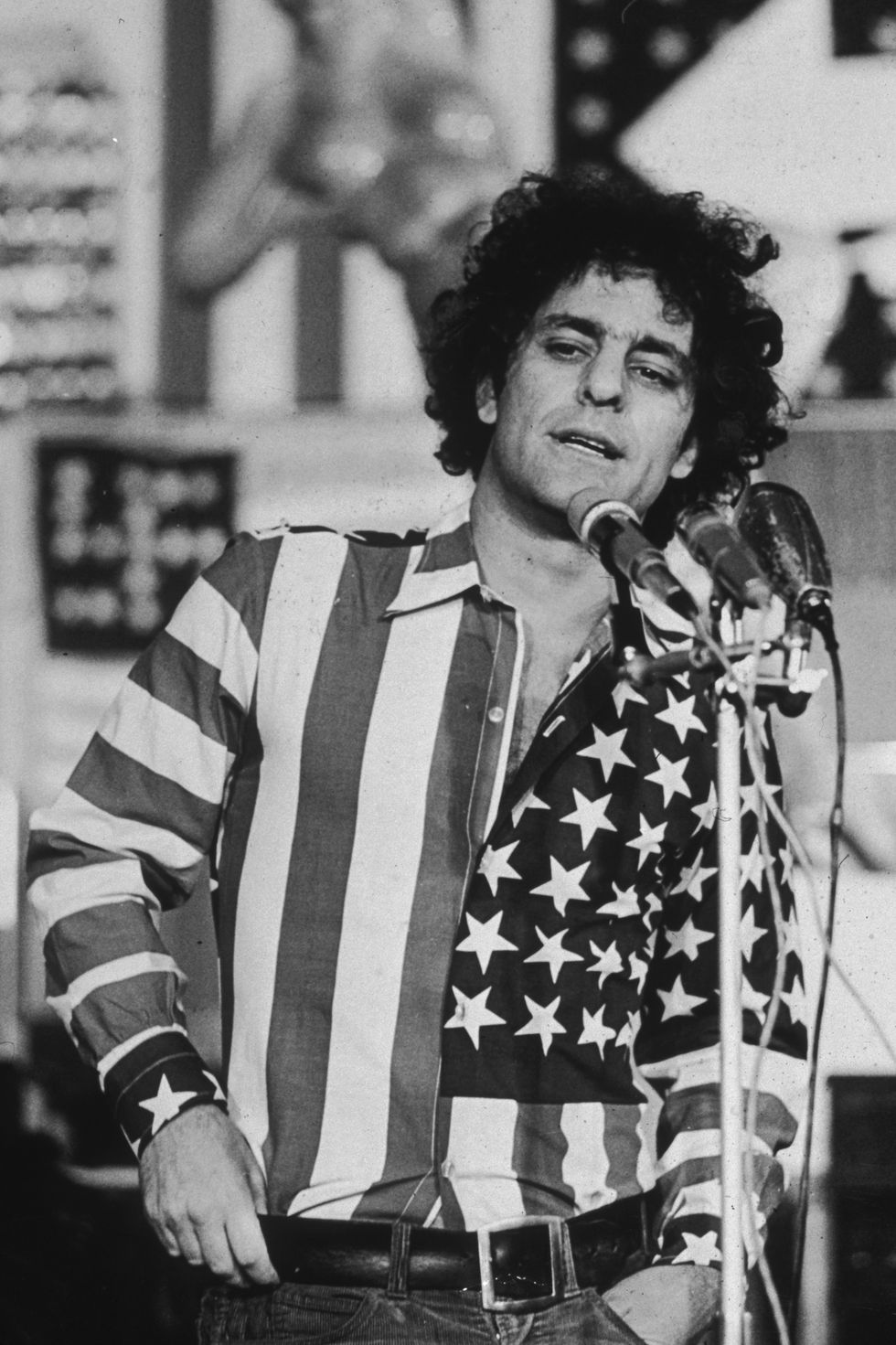 9th november 1970  political activist abbie hoffman 1936   1989, wearing a shirt made from an  american flag, speaks at a us flag themed art show at the hudson memorial church, new york city hoffman was charged with desecration of the flag for wearing a us flag shirt  photo by tyrone dukesnew york times cogetty images