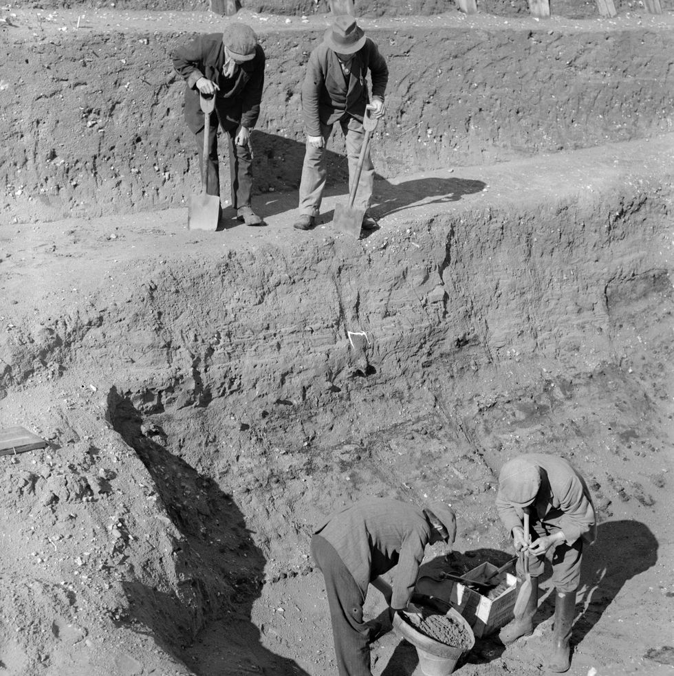 31st july 1939  workmen sift through earth at the bottom of the excavation of the anglo saxon burial ship at sutton hoo, suffolk  photo by a cooklondon expressgetty images