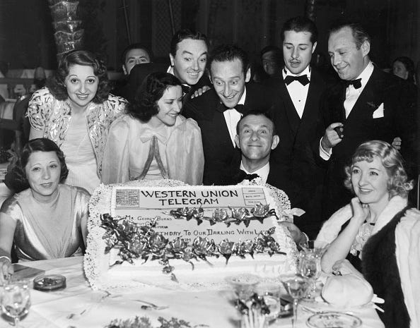 vintage birthday photos circa 1930: american comedian george burns (seated) celebrating his birthday with (left to right) mrs george levy, mary livingston, burns wife actress gracie allen, jack pearl, jack haley, al ritz, don ameche, comedian jack benny and mrs jack haley. they are at the cocoanut grove restaurant in hollywood. (photo by general photographic agency/getty images)