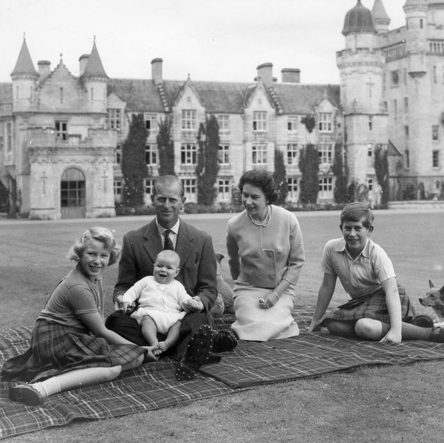 queen elizabeth ii and prince philip, duke of edinburgh with their children, prince andrew centre, princess anne left and charles, prince of wales sitting on a picnic rug outside balmoral castle in scotland, 8th september 1960 photo by keystonehulton archivegetty images