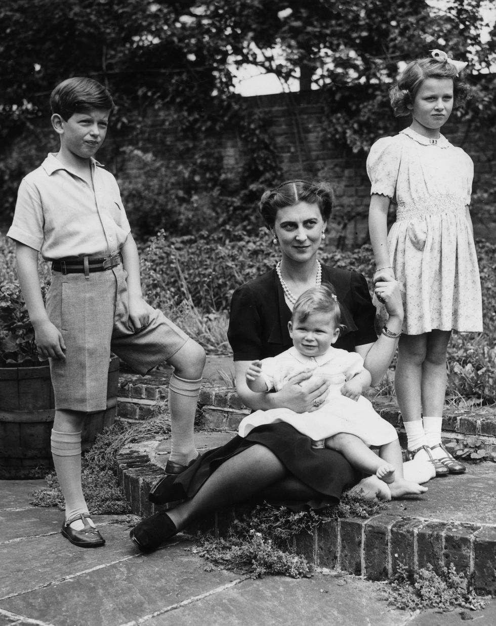 july 1943 marina, duchess of kent with her three children, prince edward later duke of kent, princess alexandra and prince michael on his first birthday, at coppins ivor, buckinghamshire photo by central pressgetty images