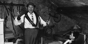29th november 1963 liverpudlian comedian ken dodd sorts through a heap of junk, including a ventriloquists dummy, a childs bicycle and a foghorn in the attic of his house photo by john prattkeystone featuresgetty images