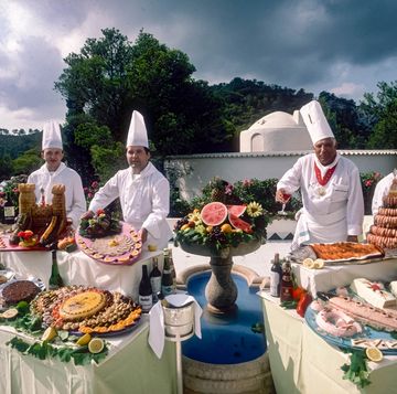 a group of chefs preparing food