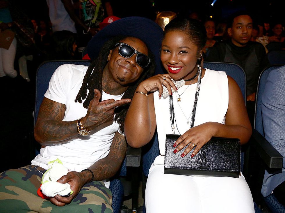 los angeles, ca   june 29 rapper lil wayne l and reginae carter attend the bet awards 14 at nokia theatre la live on june 29, 2014 in los angeles, california  photo by johnny nunezbetgetty images for bet