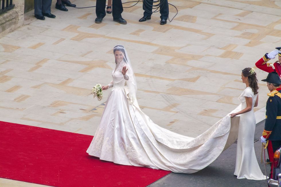 Red carpet, Dress, Carpet, Flooring, Gown, Wedding dress, Bride, Tradition, Ceremony, Event, 