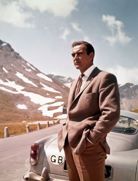 1964  actor sean connery poses as james bond next to his aston martin db5 in a scene from the united artists film goldfinger in 1964 photo by donaldson collectionmichael ochs archivesgetty images