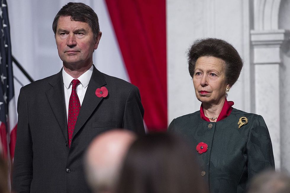 the british princess royal, princess anne, stands alongside her husband, timothy laurence, during the opening of an exhibition celebrating the 800th anniversary of the magna carta at the library of congress in washington, dc, november 6, 2014 the exhibition, which will last 10 weeks, features the lincoln cathedral magna carta, one of only four surviving copies of the original issue in 1215 afp photo  saul loeb        photo credit should read saul loebafp via getty images