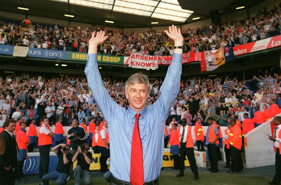 london, england   april 25  manager arsene wenger celebrates arsenal winning the premier league after the match between tottenham and arsenal at white hart lane on april 25, 2004 in london, england   photo by stuart macfarlanearsenal fc via getty images