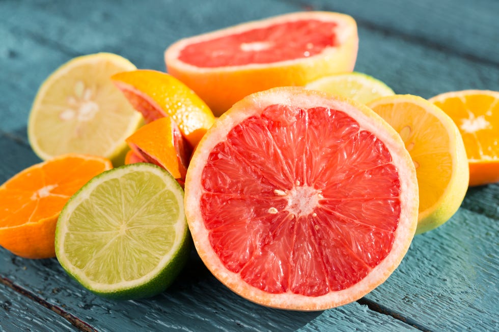 citrus fruits arranged of a wooden table