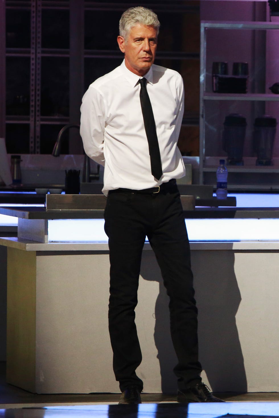 Fashion, Standing, Dress shirt, Footwear, Formal wear, Performance, White-collar worker, Event, Fashion design, Shoe, 