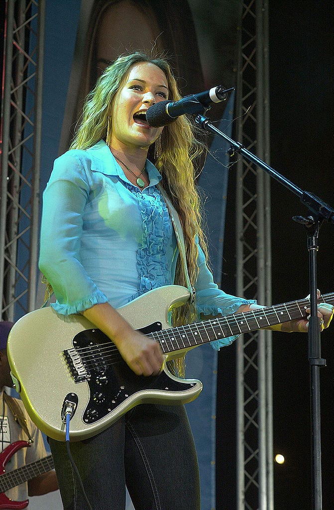 view of hoku don hos daughter performing onstage during the radio disney tour, in chicago, illinois, august 25, 2001 photo by paul natkingetty images
