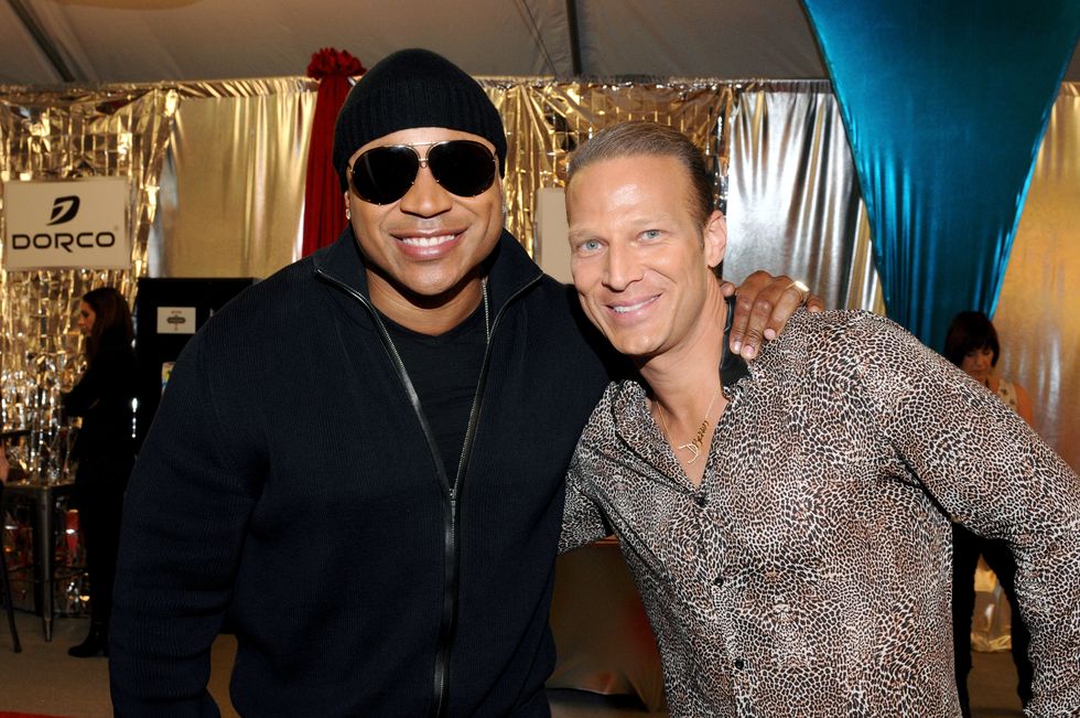 los angeles, ca   february 06 host ll cool j l and distinctive assets founder and president lash fary r attend the grammy gift lounge during the 57th annual grammy awards at the staples center on february 6, 2015 in los angeles, california  photo by vivien killileawireimage