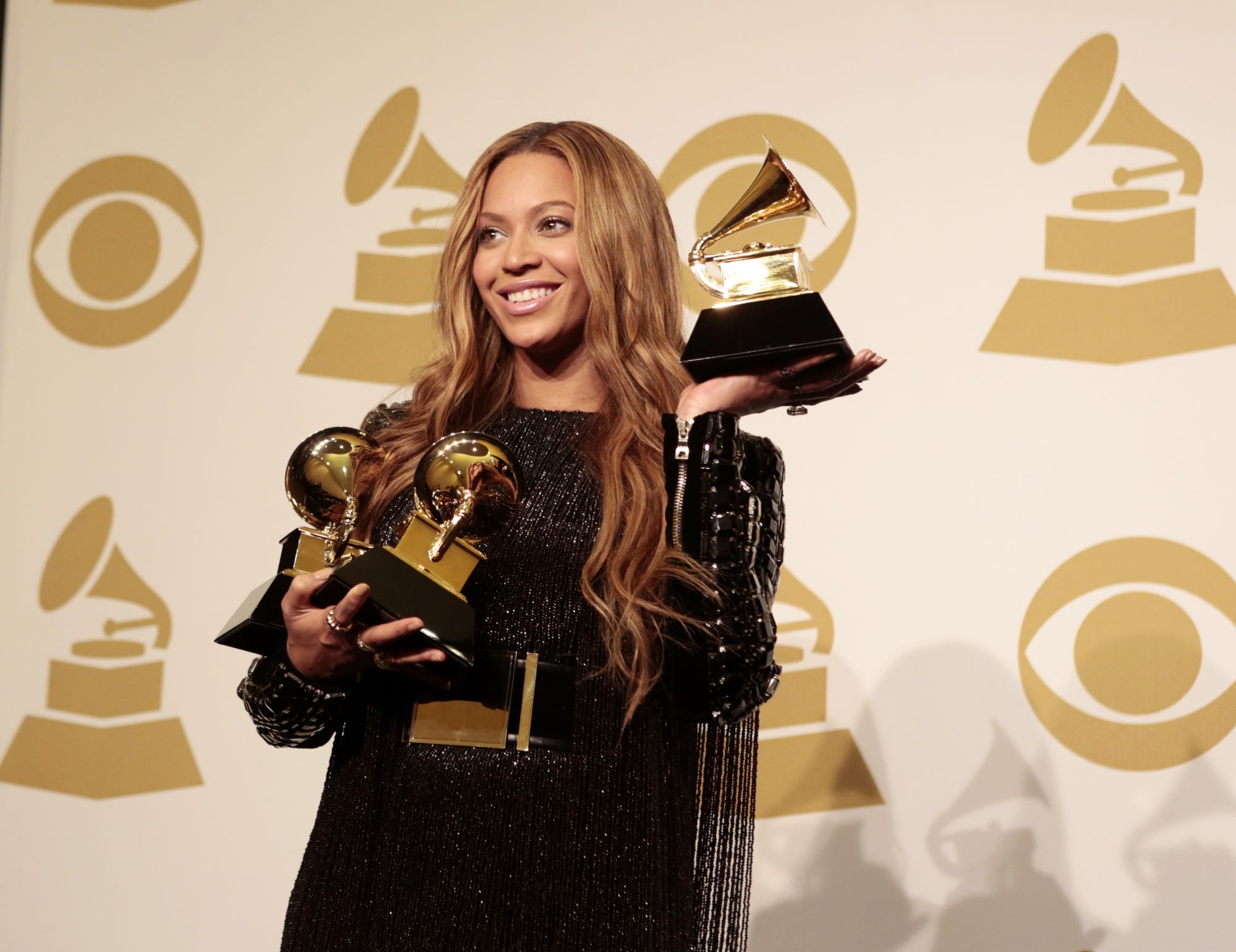 Beyonce Holding Awards