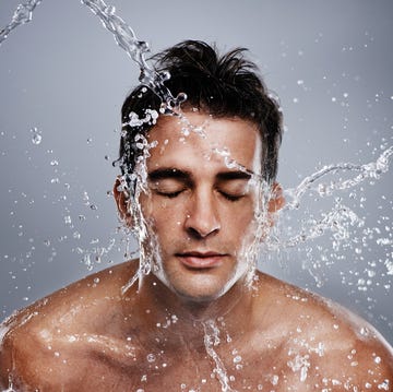 Face Wash for Men man splashing water on his face