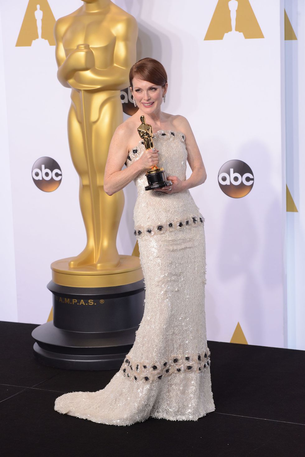 hollywood, ca february 22 actress julianne moore, with the award for best actress for still alice poses in the press room during the 87th annual academy awards at loews hollywood hotel on february 22, 2015 in hollywood, california photo by c flanigangetty images
