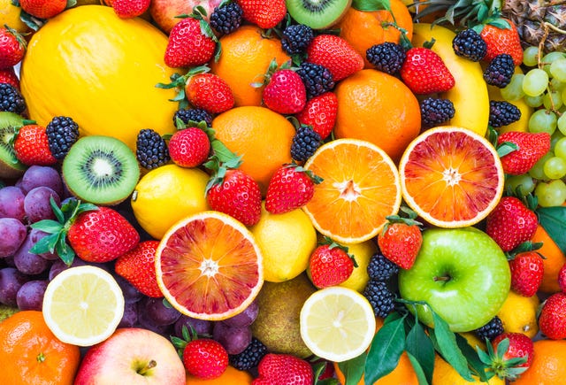 fresh mixed fruits background.organic fruits multicolore background.